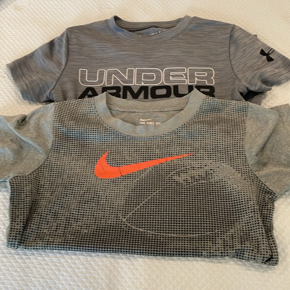Two Nike and Under Armor Dry fit tee size 7